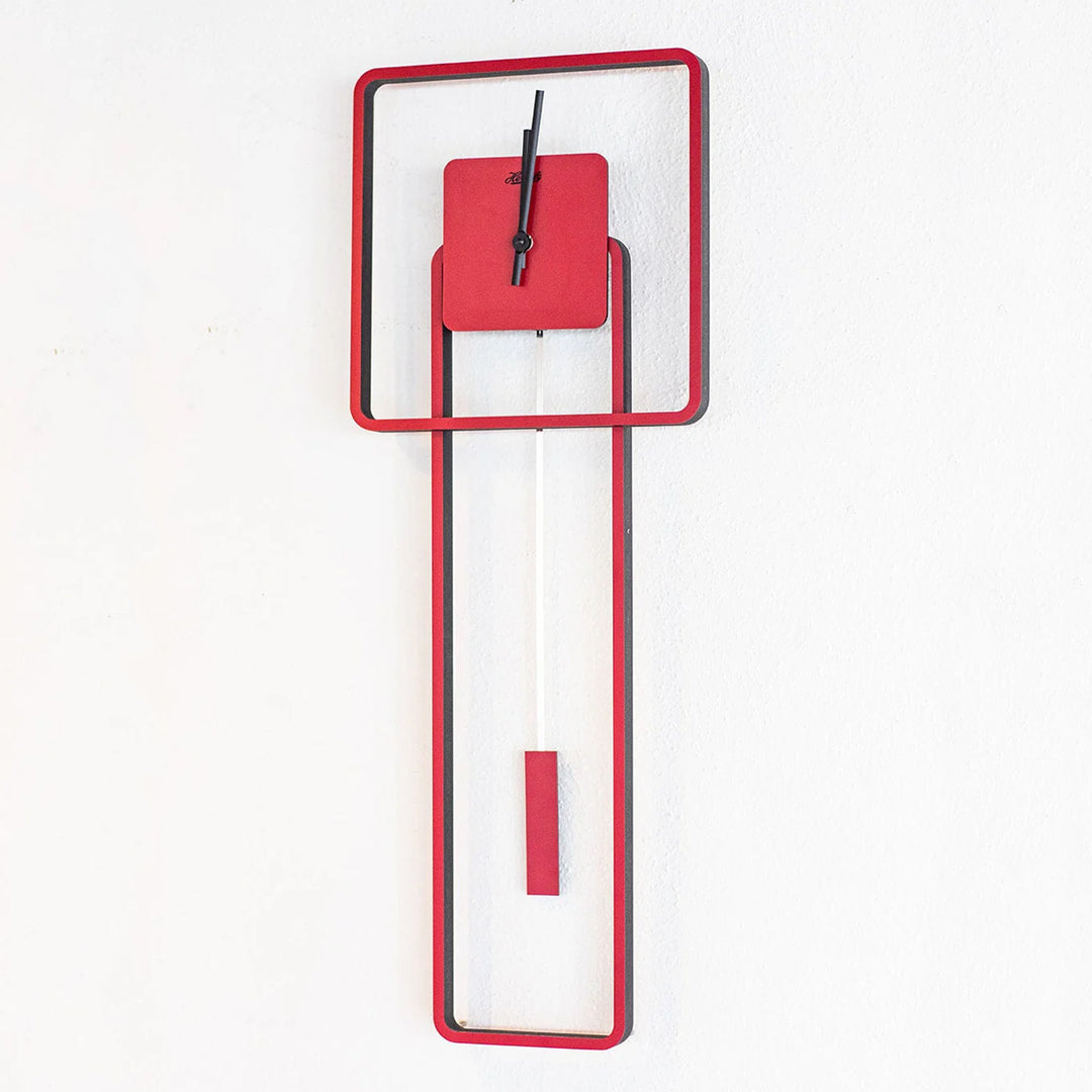 Hyper modern red wall clock with a long rectangular pendulum on a white background