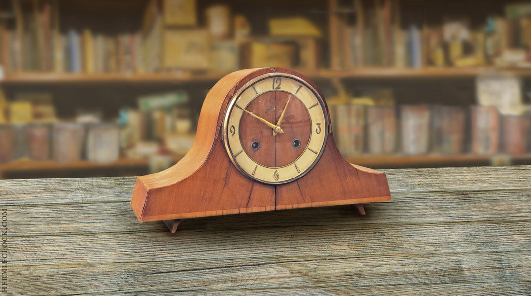We used this antique clock to inspire our charming mid-century modern mantel clock.