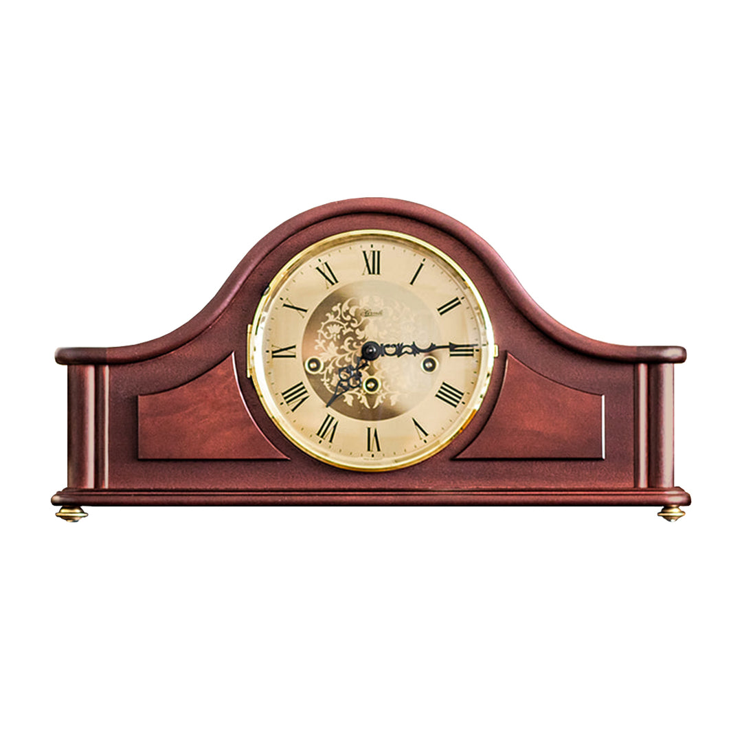Tambour style mantel clock with roman numerals, on a white background
