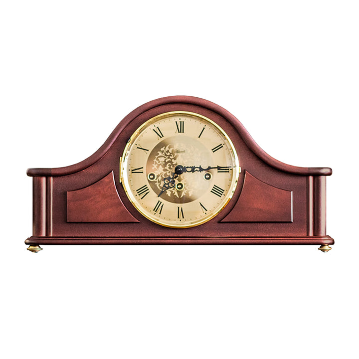 Tambour style mantel clock with roman numerals, on a white background