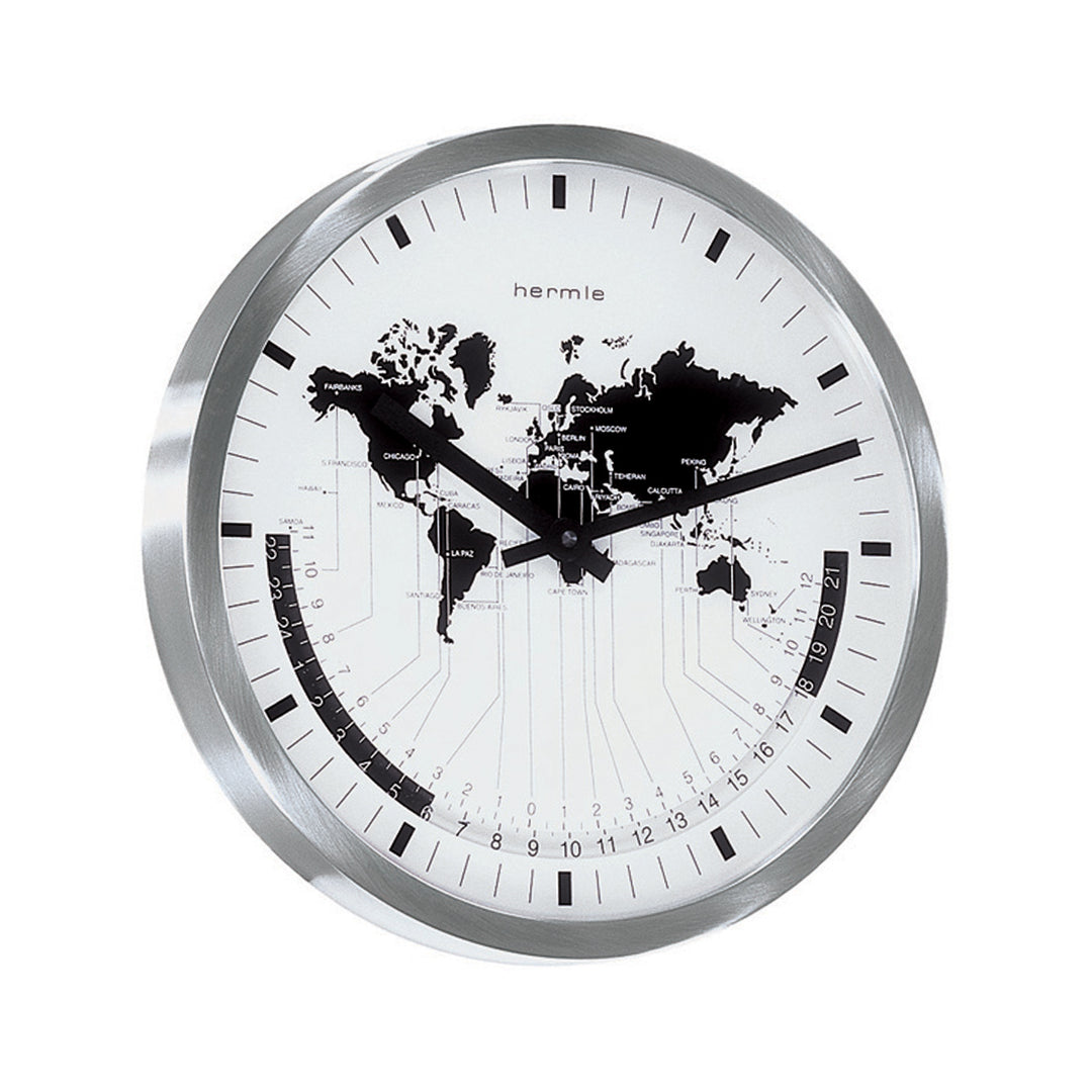 World map clock with silver framing on white background.