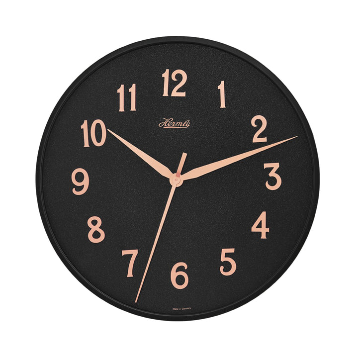 Wall clock with black face and gold numbers with Hermle logo on white background.