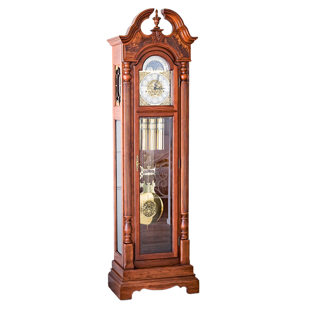 Cherry wood Grandfather clock with ornate design and brass highlights on white background