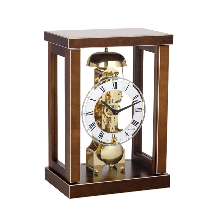 Walnut wood mantel clock with visible nickel gears and bell on white background.