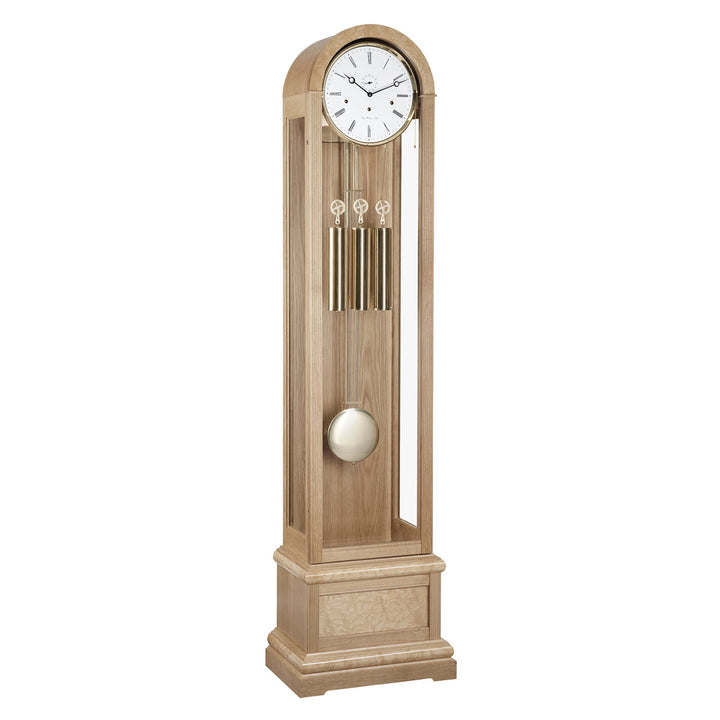 Oak Grandfather clock with brass weights and white face on white background