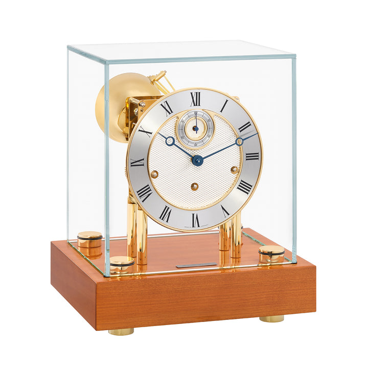 Light cherry desk clock with glass cube case and silver clock face with brass highlights