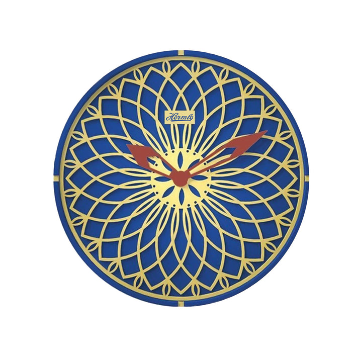 Blue and yellow wall clock with red hands on white background.