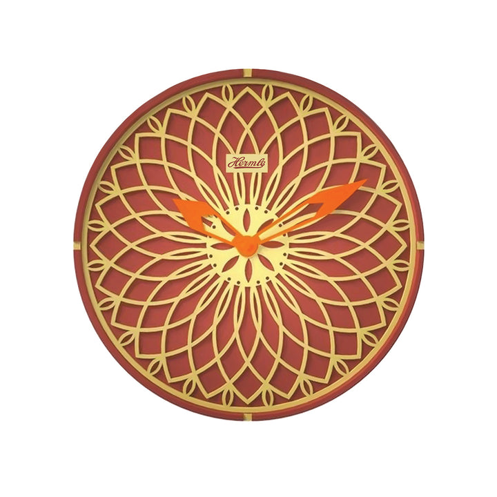 Red and yellow wall clock with orange hands on white background.