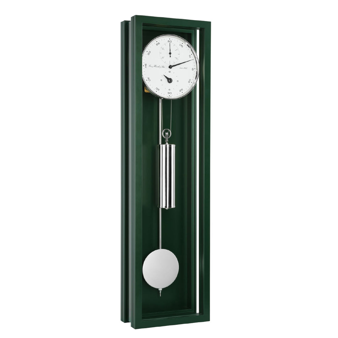 Green wall clock with pendulum on a white background