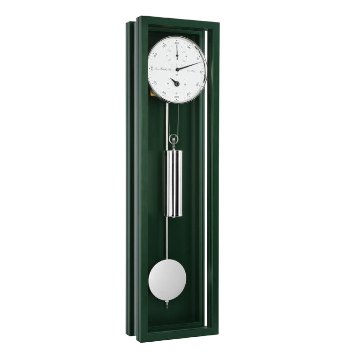 Green wall clock with pendulum on a white background