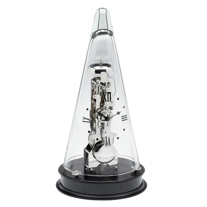 Conical mechanical clock with silver gearing visible beneath glass dome, sitting on black base