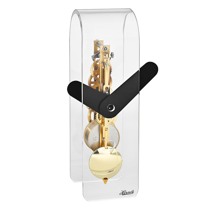 Clear desk clock with visible brass gearing inside and black hands
