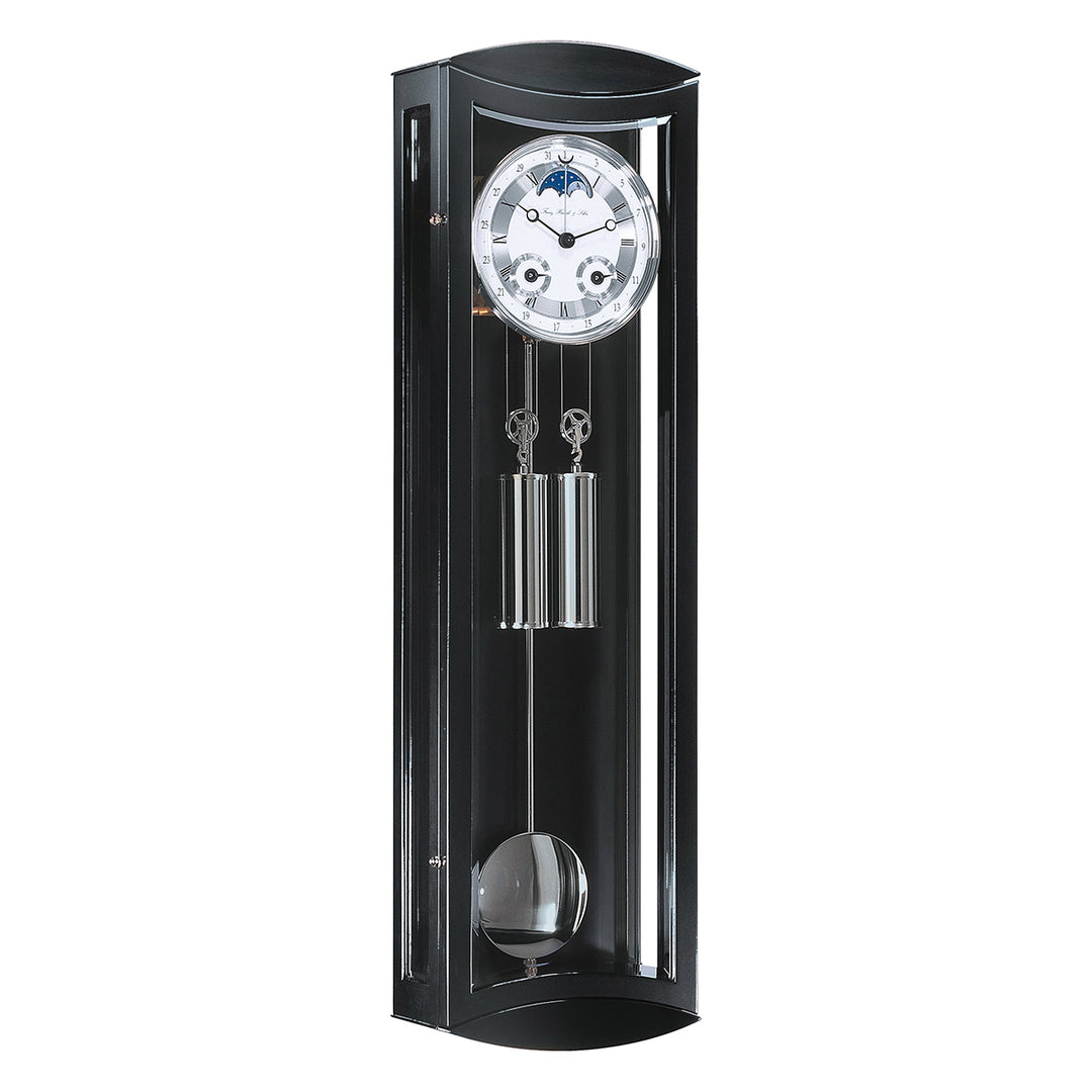 Black and silver wall clock with blue moon dial, pendulum and dual weights on white background.