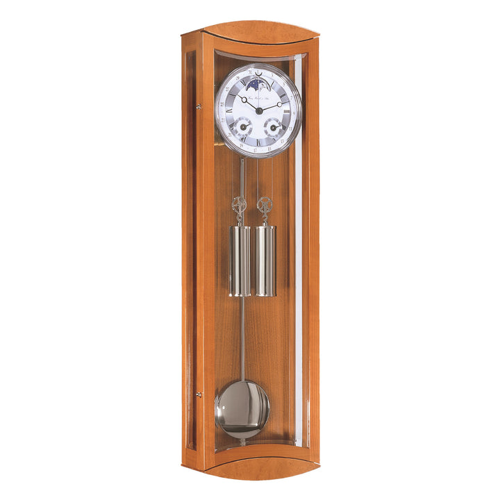 Cherry wood and silver wall clock with blue moon dial, pendulum and dual weights on white background.