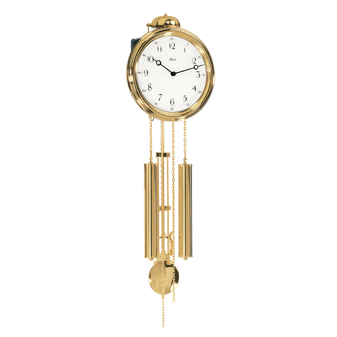 Gold finish wall clock with chains, black hands and weights on white background.