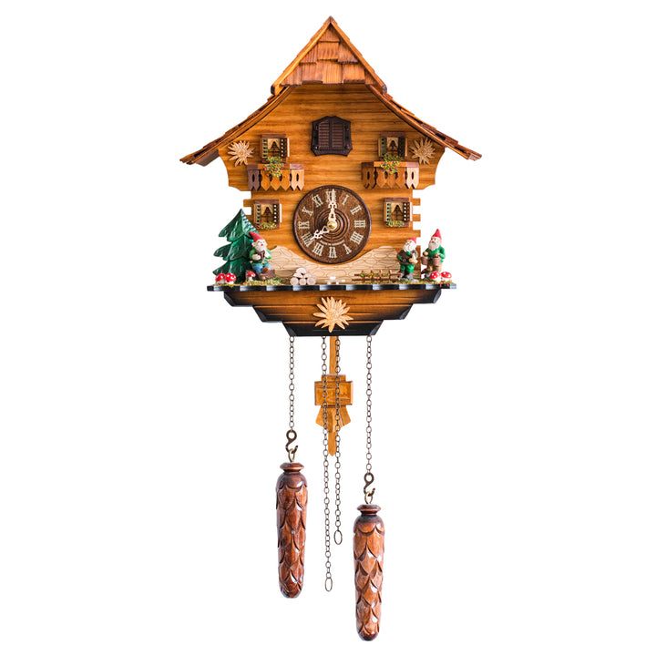 Front view of detailed wooden cuckoo clock with gnomes and pine tree on white background 