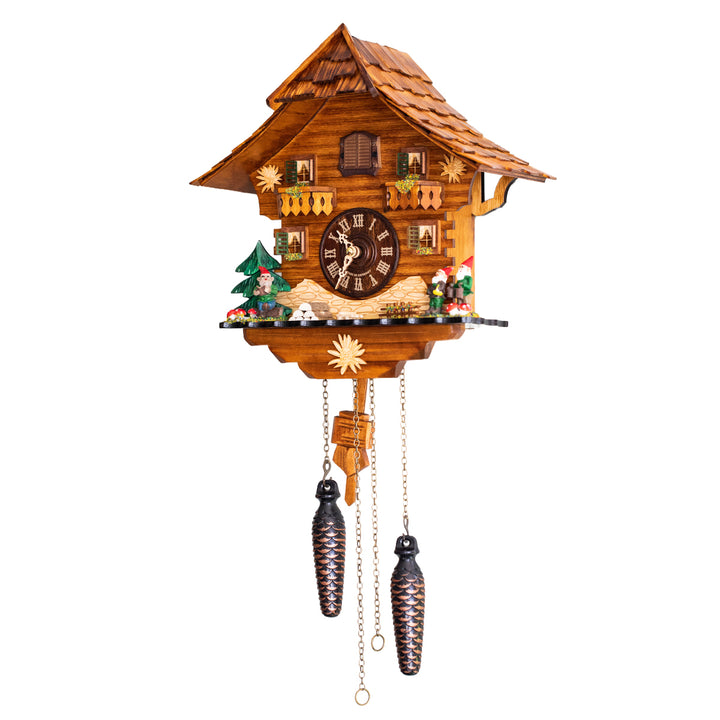 Angled view of intricate wooden cuckoo clock with gnomes and pine tree
