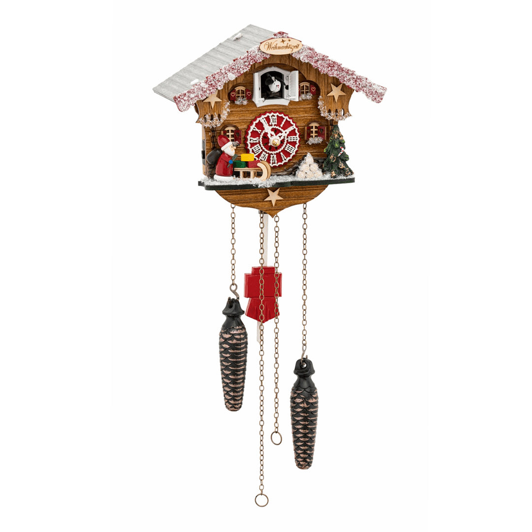 Christmas themed wooden cuckoo clock with wooden Santa figurine, white roman numerals and snowy roof on white background.