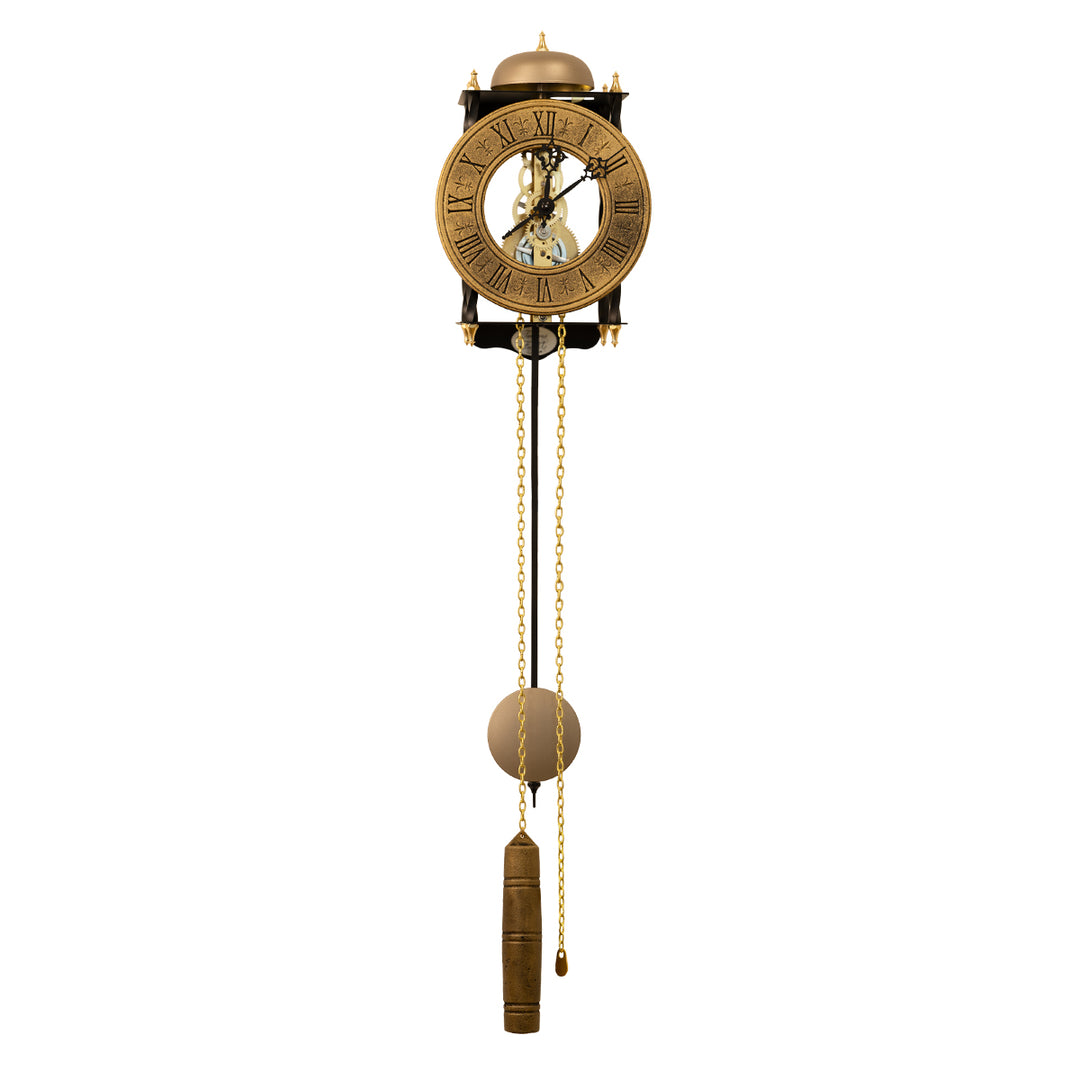 Black skeleton clock with antique-style brass face and etched roman numerals on white background with brass chains and single weight hanging down.