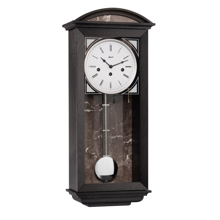 Retro style black wood wall clock with nickel highlights and three holes in the face for winding the mechanical movement inside.