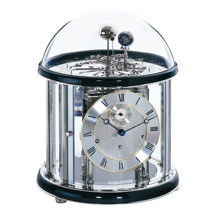 Black and silver mechanical  Tellurium clock with glass dome and nickel plated gears visible on white background