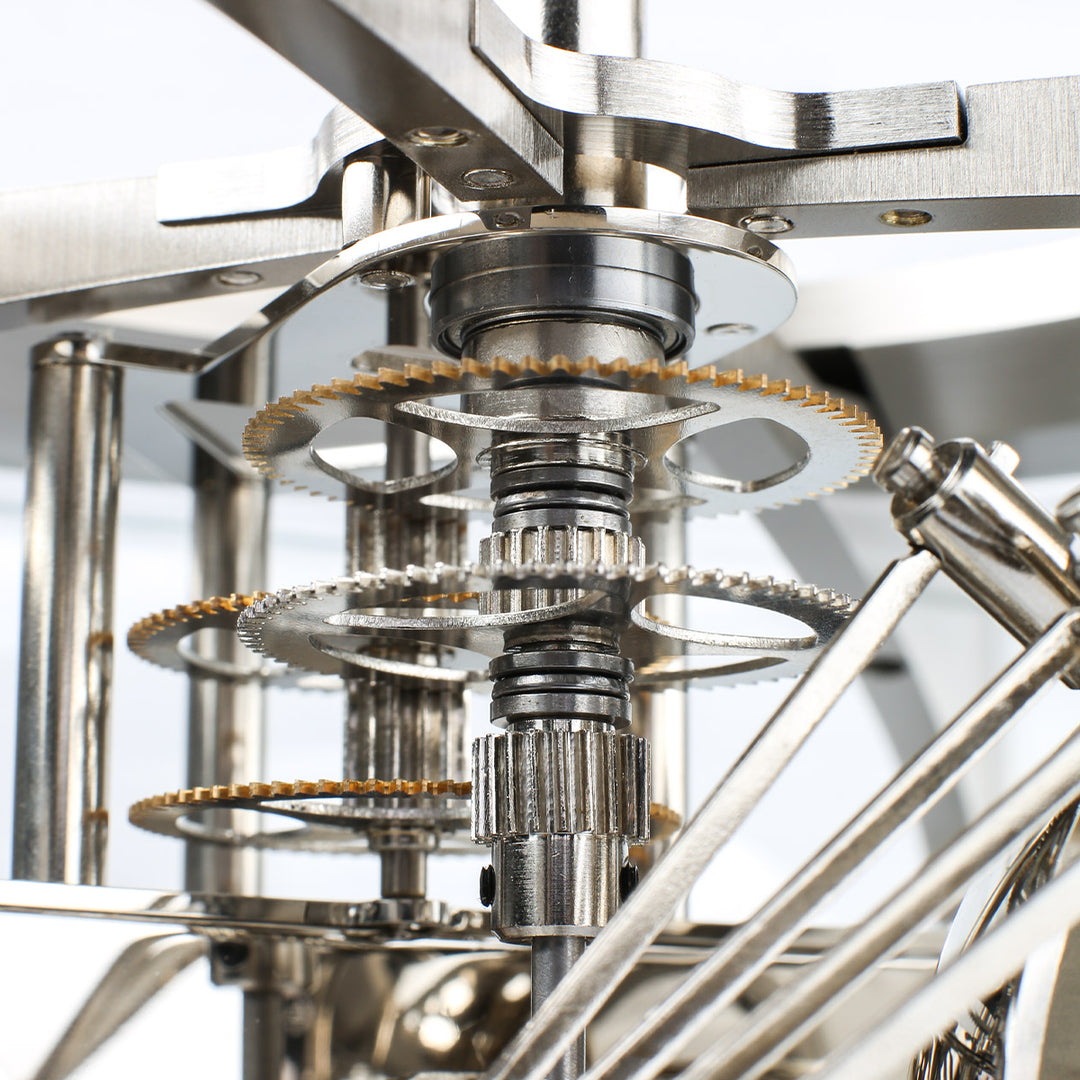 Close up of nickel plated gears and hammers inside Tellurium 