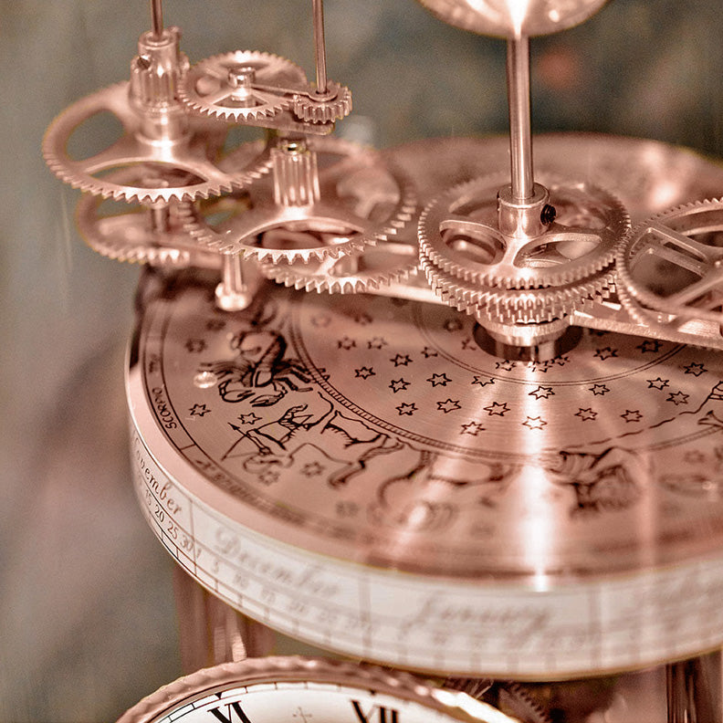 Rose Gold and White Astrolabium clock with intricate gears and zodiac signs