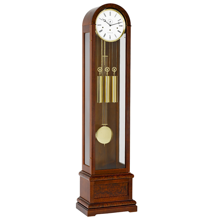 Wooden Charlotte grandfather clock by Hermle with a white face on a white background