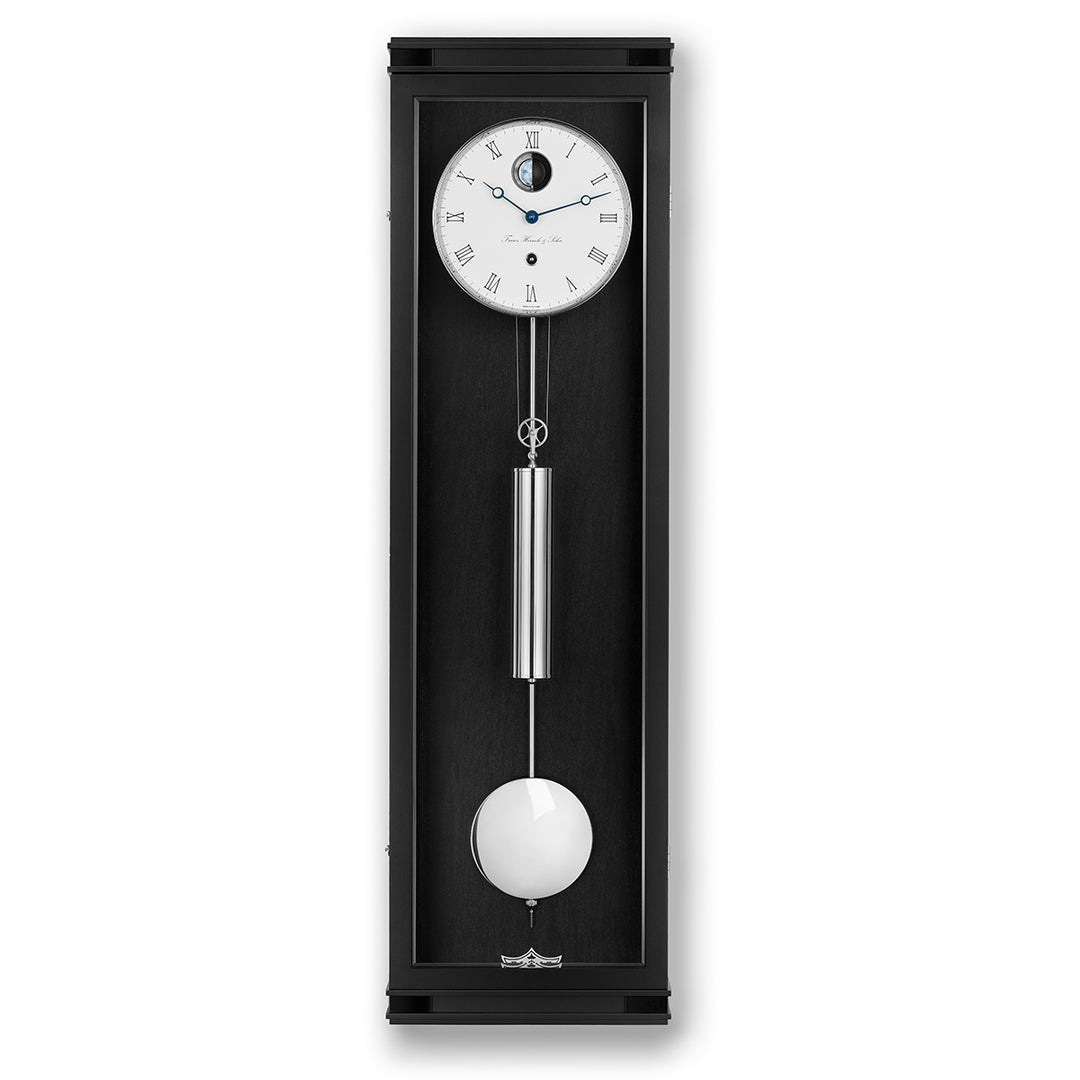 Hermle wall clock with pendulum on a white background